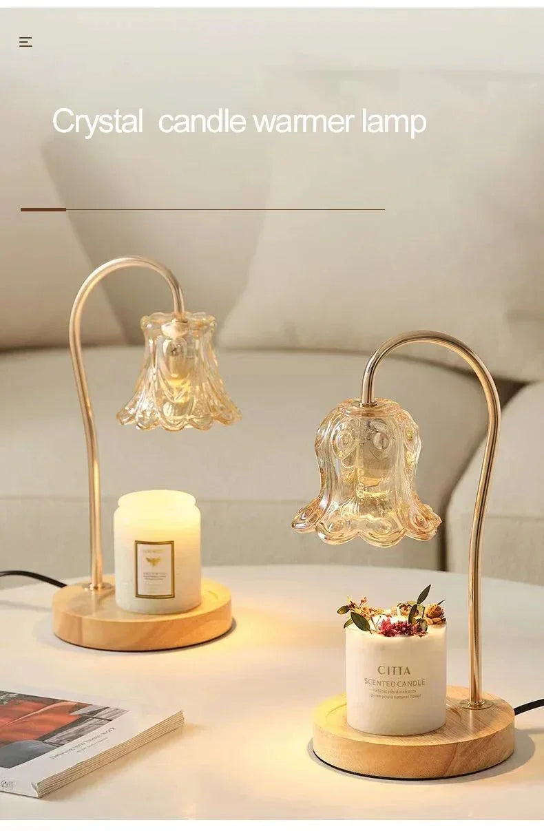Crystal candle warmer lamps with glass shades on a modern table, warming scented candles