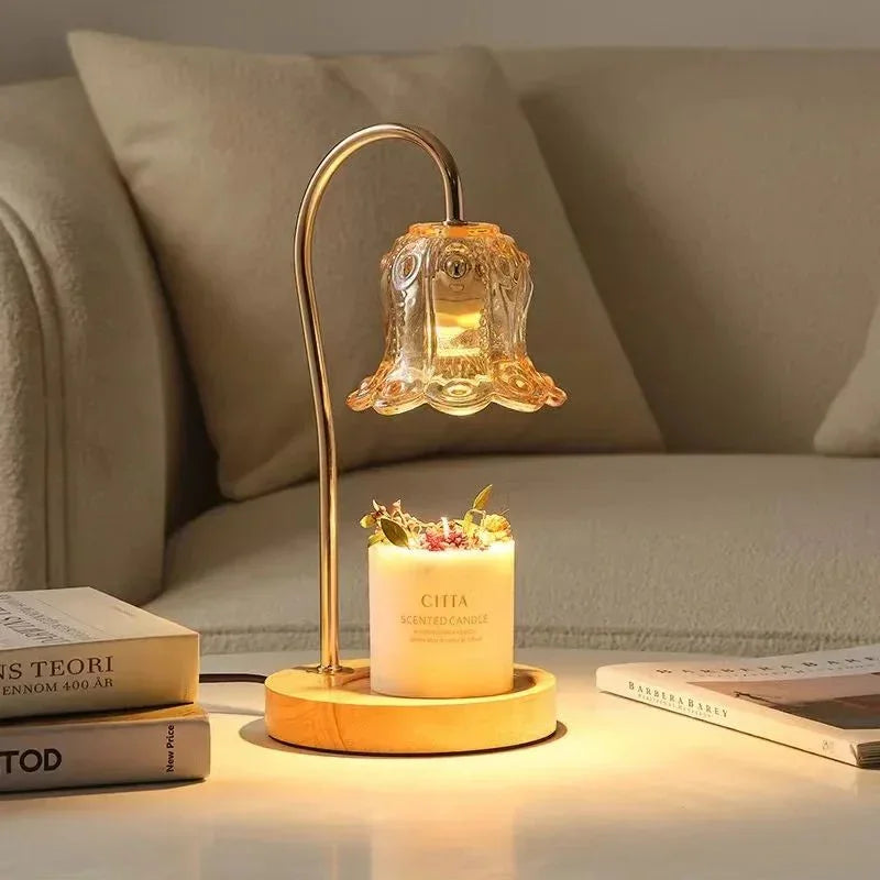 Vintage glass lamp over scented candle on wooden base, cozy living room decor