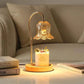 Vintage glass lamp with gold base illuminating a candle, modern cozy home decor scene