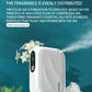 Modern smart home diffuser with fine atomization spraying fragrance, white flowers nearby